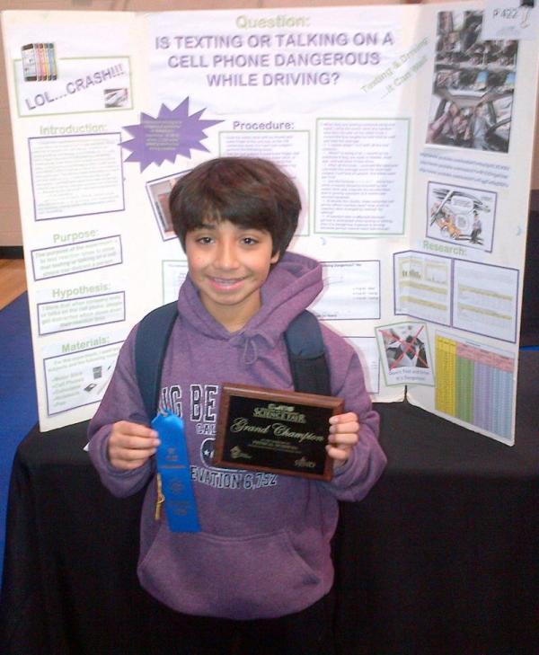 How distracted are drivers? This kid was not looking to the Bible for answers...